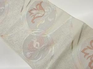 丸文に抽象花唐草模様織出し名古屋帯